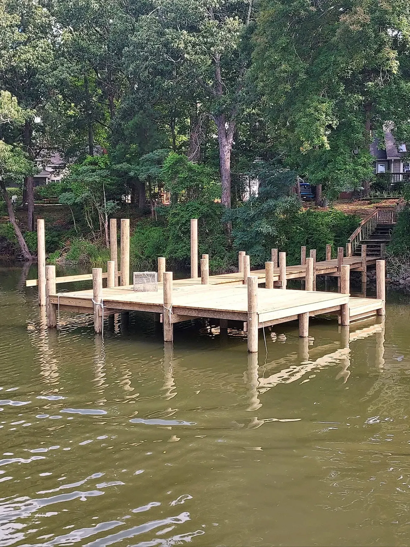 Square dock platform on new pilings