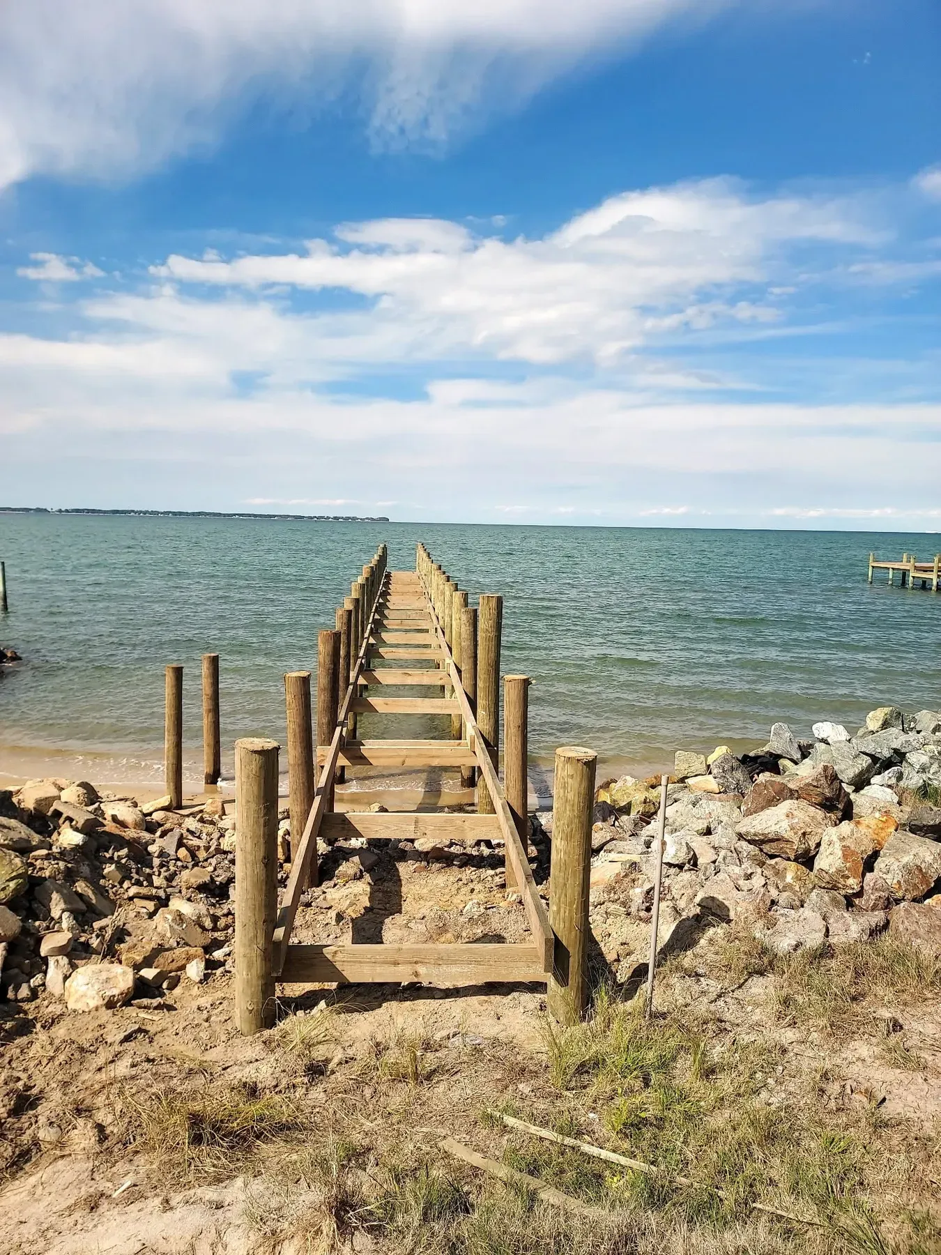 Pier framing on new pilings off a beach